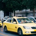 yellow taxi cabs on the road