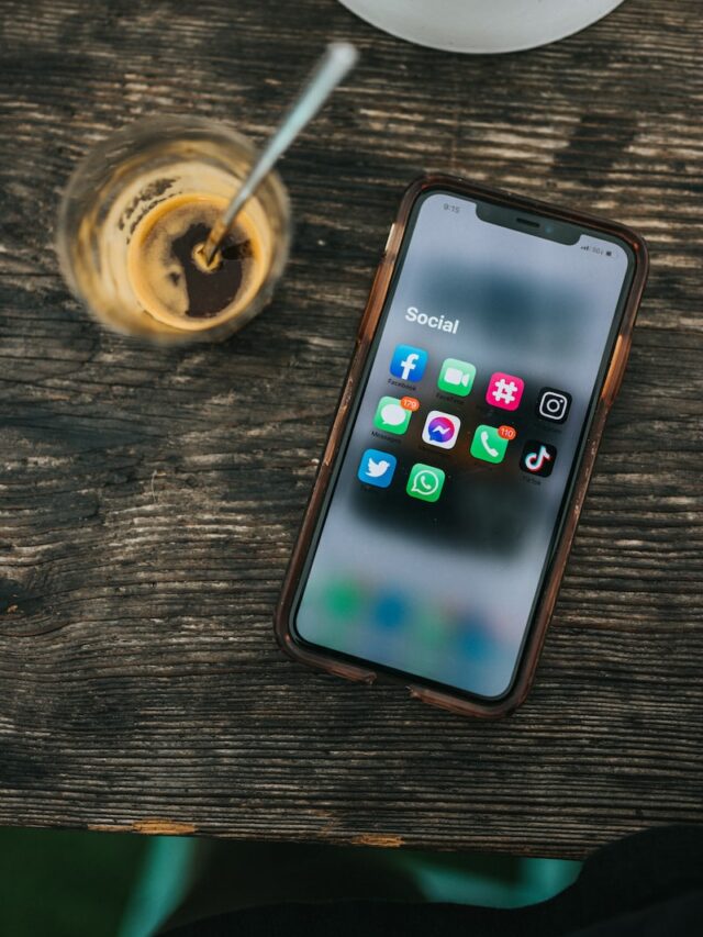 white samsung android smartphone on brown wooden table