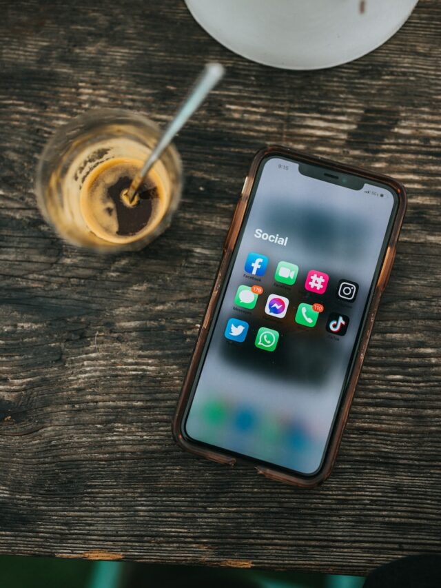 white samsung android smartphone on brown wooden table