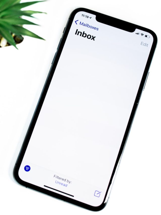 black iphone 5 on white surface