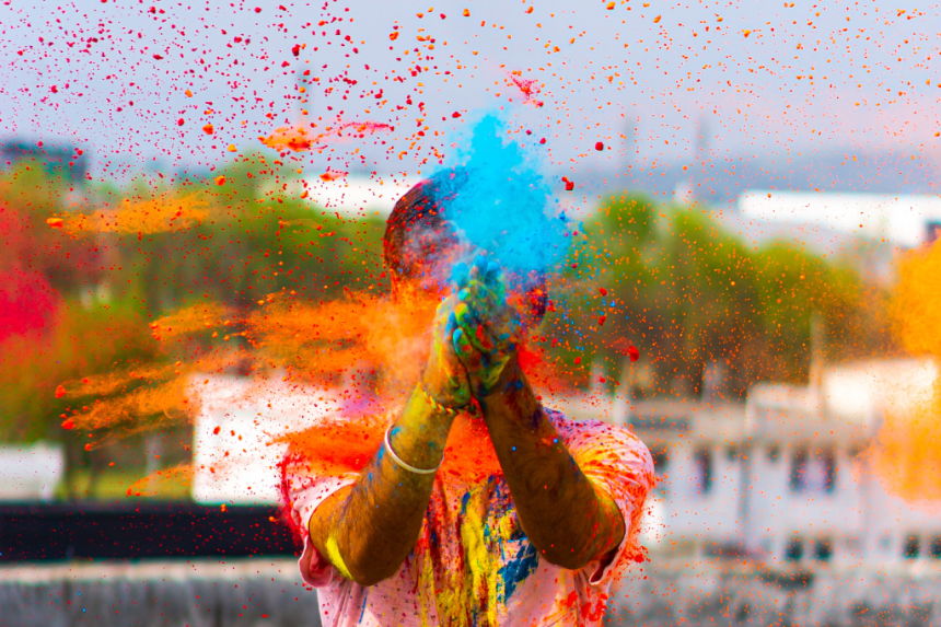 Person holding holi powders