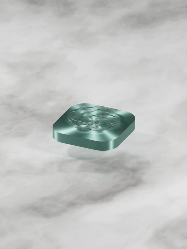 a square object sitting on a marble surface