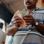 Man holding banknote