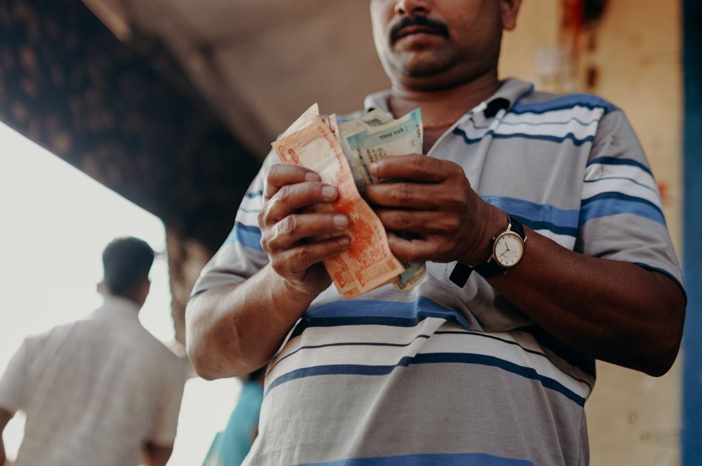 Man holding banknote