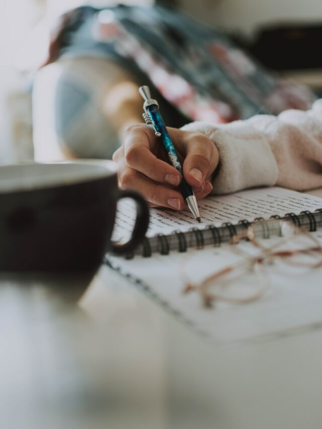 selective focus photography of pen