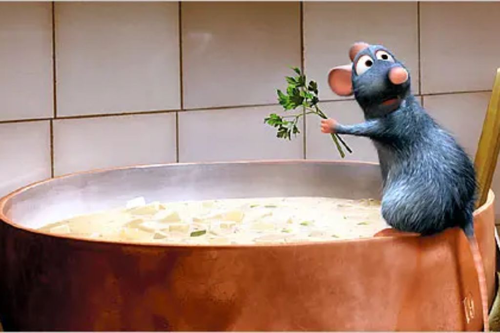 Remy cooking in the kitchen in 'Ratatouille'
