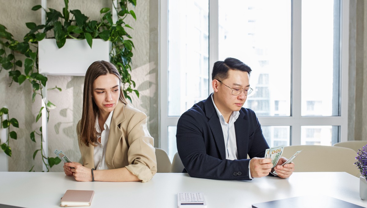 Man and woman sitting in a office
