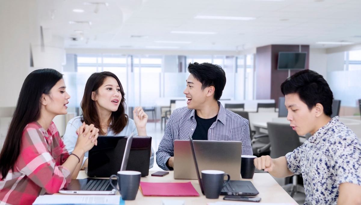 employees brainstorming in office